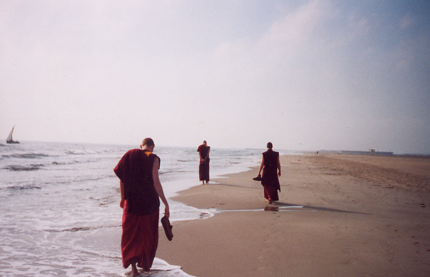 Stephan Pende, mindfulness teacher, walking along a beach as a Buddhist monk 